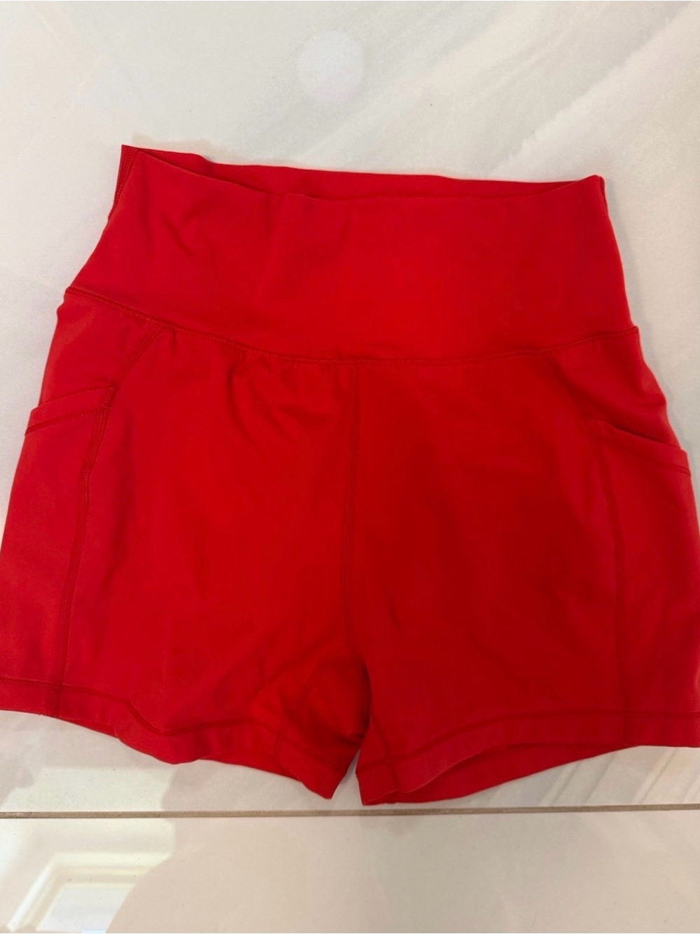 Alphalete High-Waist Red Active Shorts with Side Pockets